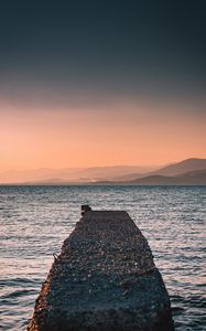 Preview wallpaper sea, plate, breakwater, water, coast, hills