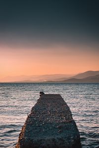 Preview wallpaper sea, plate, breakwater, water, coast, hills