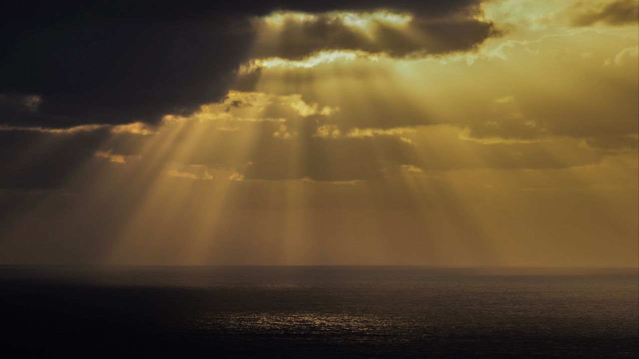 Wallpaper sea, rays, sky, clouds