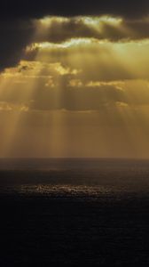Preview wallpaper sea, rays, sky, clouds