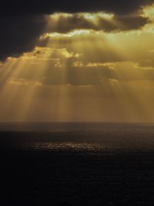 Preview wallpaper sea, rays, sky, clouds