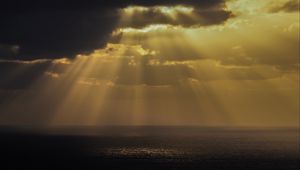 Preview wallpaper sea, rays, sky, clouds