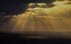 Preview wallpaper sea, rays, sky, clouds