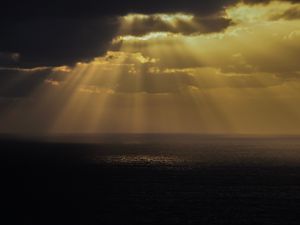 Preview wallpaper sea, rays, sky, clouds