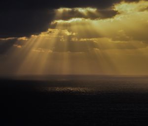 Preview wallpaper sea, rays, sky, clouds