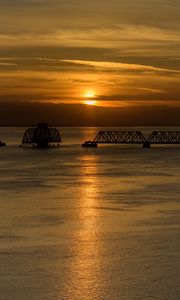 Preview wallpaper sea, ripples, bridge, dawn, clouds, nature