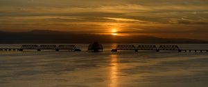 Preview wallpaper sea, ripples, bridge, dawn, clouds, nature