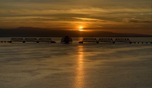 Preview wallpaper sea, ripples, bridge, dawn, clouds, nature