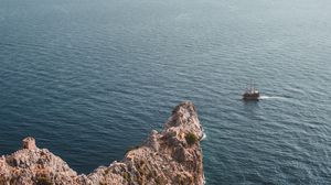 Preview wallpaper sea, rock, aerial view, ship, water