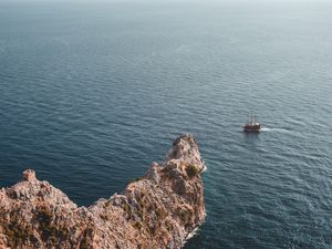 Preview wallpaper sea, rock, aerial view, ship, water