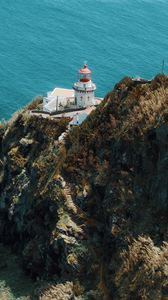 Preview wallpaper sea, rock, building, architecture, cliff