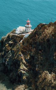 Preview wallpaper sea, rock, building, architecture, cliff