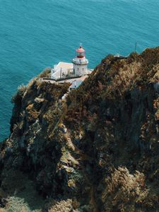 Preview wallpaper sea, rock, building, architecture, cliff