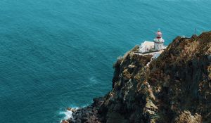 Preview wallpaper sea, rock, building, architecture, cliff