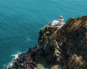 Preview wallpaper sea, rock, building, architecture, cliff