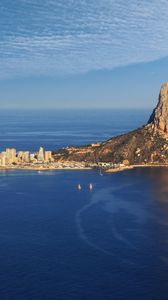 Preview wallpaper sea, rock, buildings, boats, sails