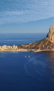 Preview wallpaper sea, rock, buildings, boats, sails