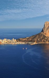 Preview wallpaper sea, rock, buildings, boats, sails