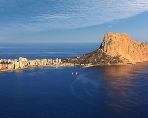 Preview wallpaper sea, rock, buildings, boats, sails