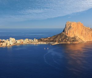 Preview wallpaper sea, rock, buildings, boats, sails