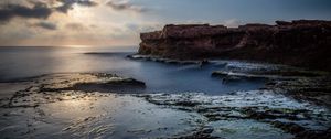 Preview wallpaper sea, rock, coast, relief, long exposure, landscape