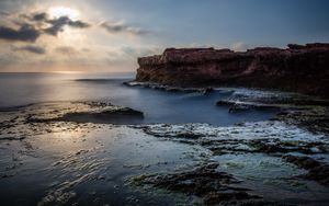 Preview wallpaper sea, rock, coast, relief, long exposure, landscape