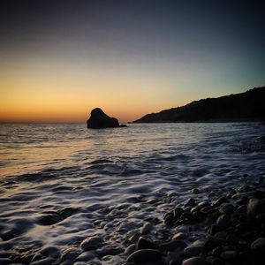 Preview wallpaper sea, rock, stones, pebbles, landscape