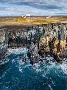 Preview wallpaper sea, rock, stones, lighthouse, nature