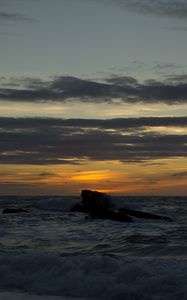 Preview wallpaper sea, rock, sunset, dark, landscape