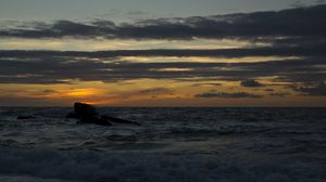 Preview wallpaper sea, rock, sunset, dark, landscape