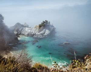 Preview wallpaper sea, rock, trees, fog, nature