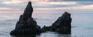 Preview wallpaper sea, rock, water, dusk, landscape