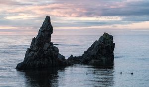 Preview wallpaper sea, rock, water, dusk, landscape