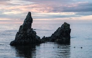 Preview wallpaper sea, rock, water, dusk, landscape