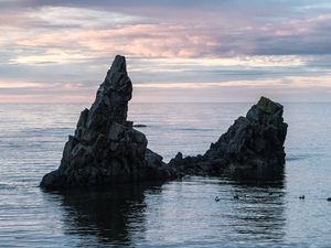 Preview wallpaper sea, rock, water, dusk, landscape