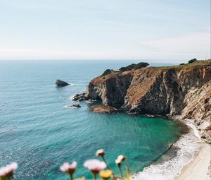 Preview wallpaper sea, rocks, beach, cliff, nature, landscape