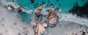 Preview wallpaper sea, rocks, beach, buildings, palm trees, aerial view