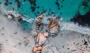 Preview wallpaper sea, rocks, beach, buildings, palm trees, aerial view