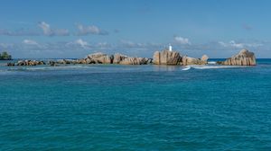 Preview wallpaper sea, rocks, buildings, nature