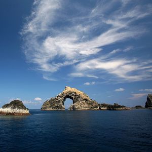 Preview wallpaper sea, rocks, clouds