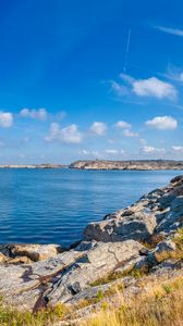 Preview wallpaper sea, rocks, coast, landscape, water, horizon, clouds, nature