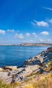 Preview wallpaper sea, rocks, coast, landscape, water, horizon, clouds, nature