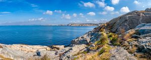 Preview wallpaper sea, rocks, coast, landscape, water, horizon, clouds, nature