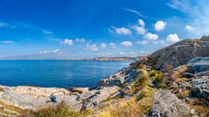 Preview wallpaper sea, rocks, coast, landscape, water, horizon, clouds, nature