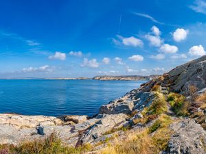 Preview wallpaper sea, rocks, coast, landscape, water, horizon, clouds, nature