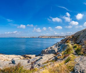 Preview wallpaper sea, rocks, coast, landscape, water, horizon, clouds, nature