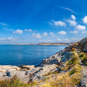 Preview wallpaper sea, rocks, coast, landscape, water, horizon, clouds, nature