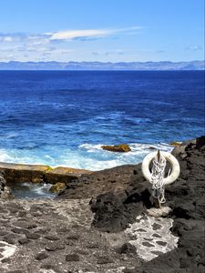 Preview wallpaper sea, rocks, lifebuoy, view