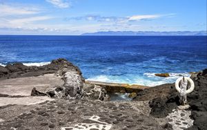 Preview wallpaper sea, rocks, lifebuoy, view