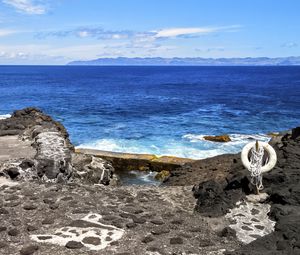 Preview wallpaper sea, rocks, lifebuoy, view